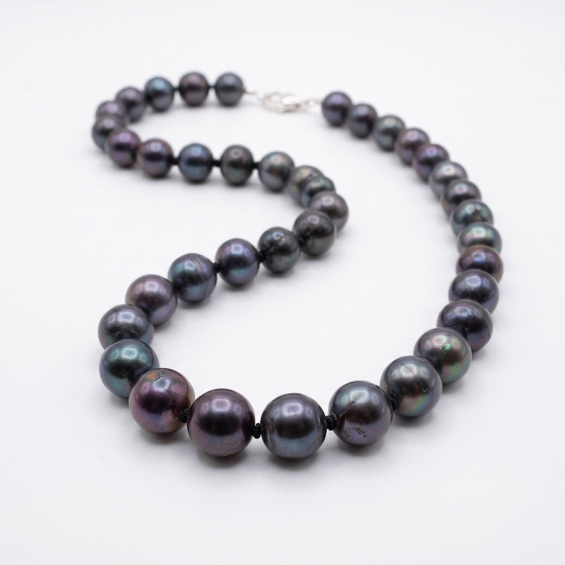 Peacock pearl necklace close-up