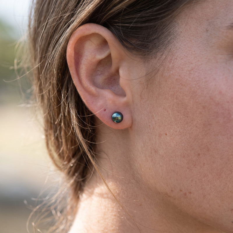 5mm peacock pearl studs worn