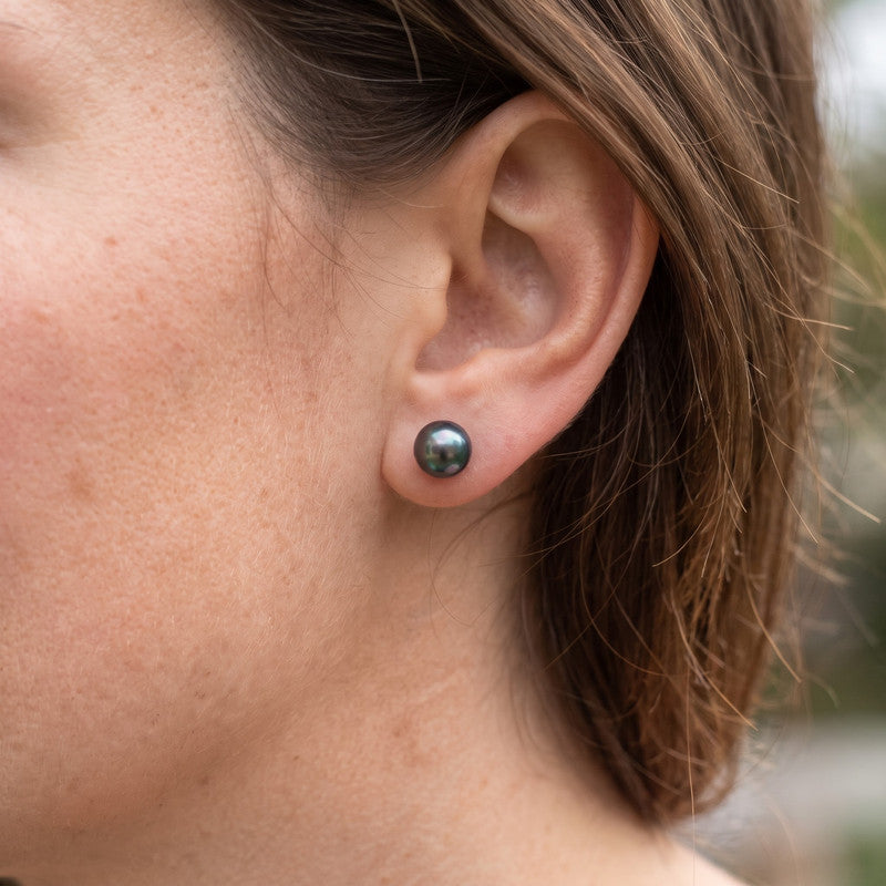 7mm peacock pearl studs worn